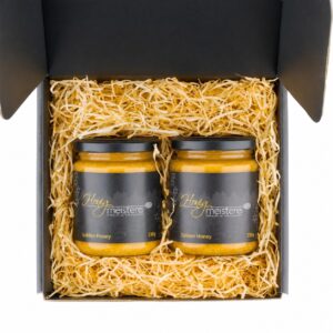 Draufsicht auf das Golden Honey Geschenkset mit zwei 330-g-Gläsern in schwarzer Box
